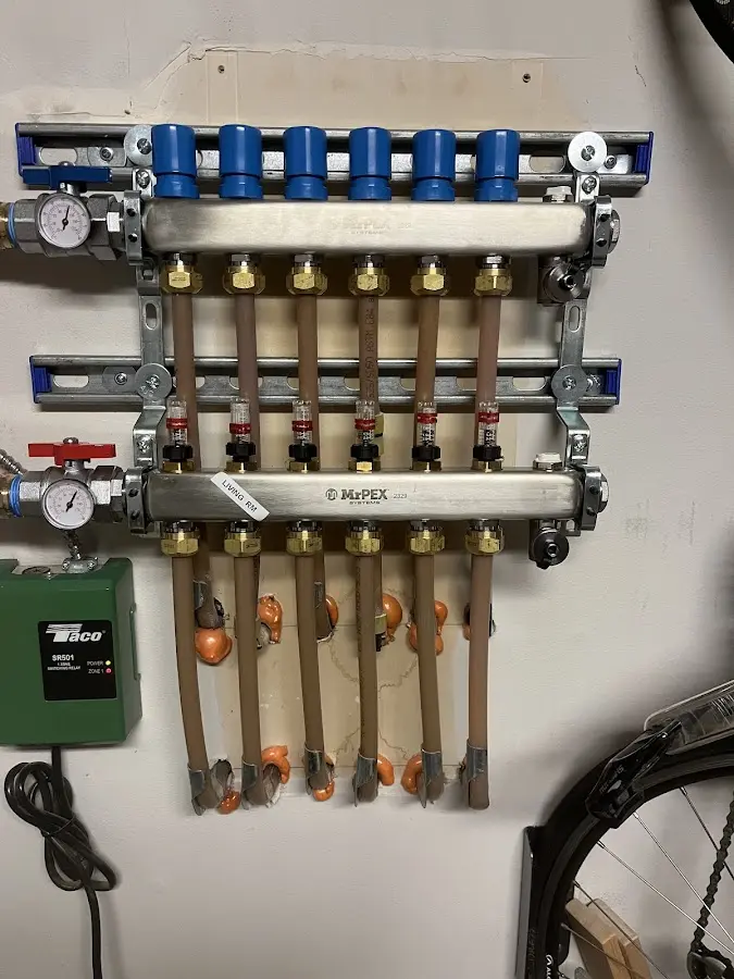 Plumber performing Water Heater Repair at a residential property in Haleyville